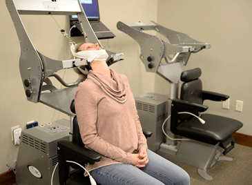 This photo shows a woman using the iTrac Spine Remodeling System. This photo shows a woman using the iTrac Spine Remodeling System.